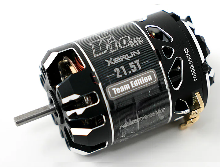 Close-up of a high-performance motor with branding on a white background